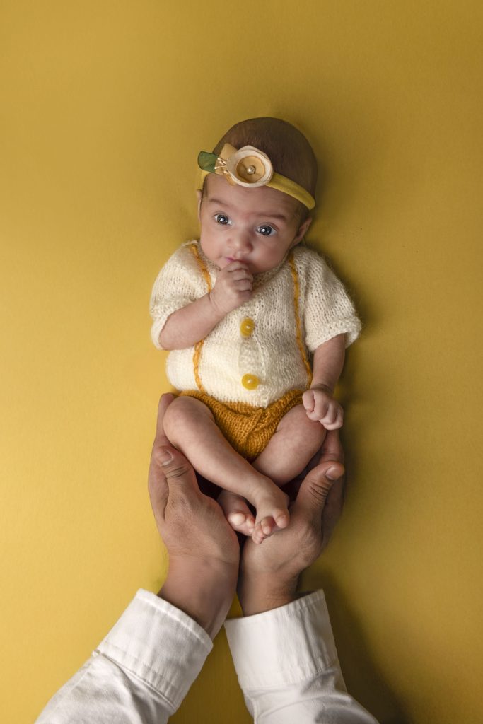 Newborn baby portrait with soft neutral tones, Nook Look studio session